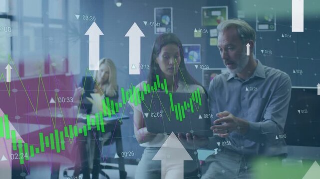 Market overlay appearing, lead guiding analyst pointing at laptop showing finance uptrend