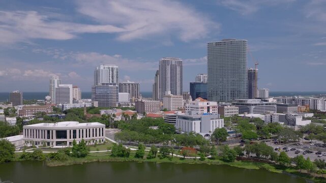 Cinematic aerial drone footage pulling back from downtown St Pete and Mirror Lake