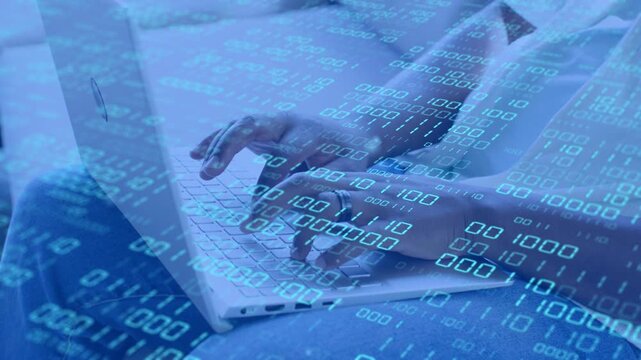 Man typing on lap laptop, initial keystroke initiating drifting blue binary overlay for tech demo