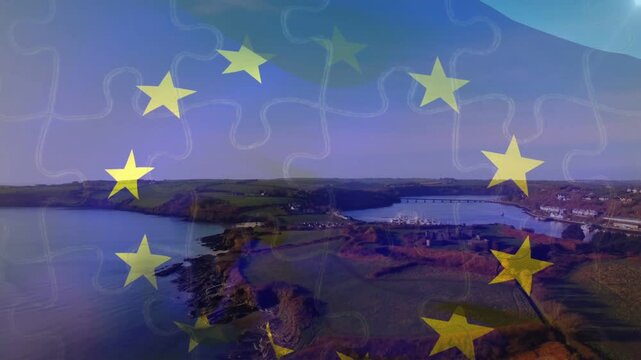 Hand entering upper right, placing white piece down, aligning, completing EU stars overlay over bay