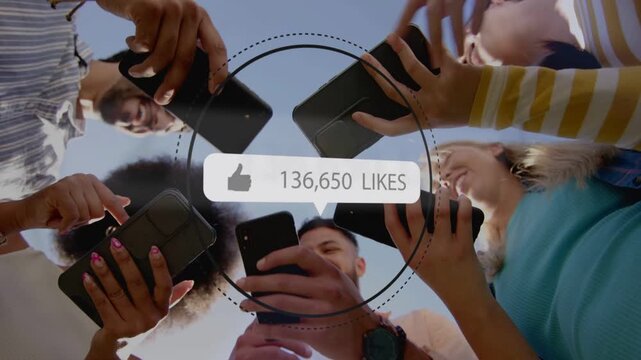 Five adults leaning low tapping phones and watching animated like-count rising for social media