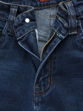 Open Zipper Fly and Waistband of Dark Blue Denim Jeans with Bar Tack Stitch