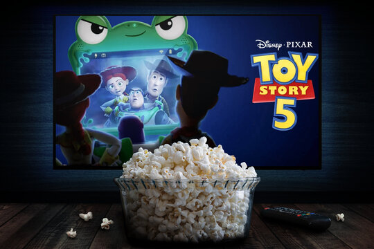 Cali, Colombia - May 12 2026: Popcorn and TV displaying Disney Pixar Toy Story 5