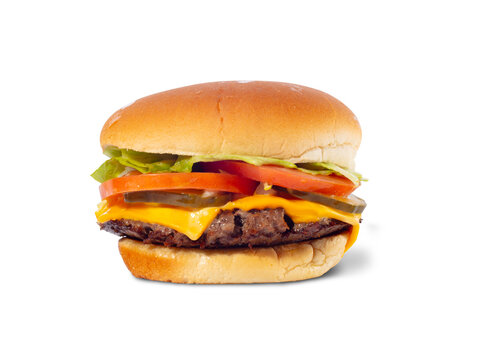 Loaded cheeseburger with lettuce, tomato, onion and pickles isolated on white background