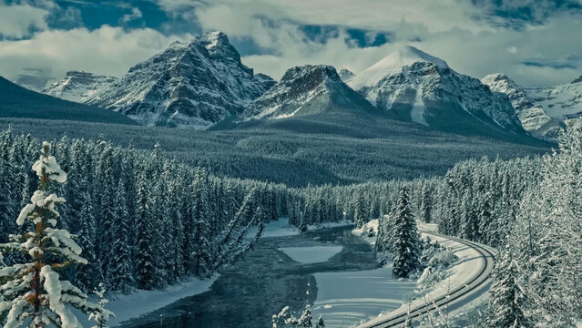 Bow River Valley Winter Panorama with Railway and Rocky Mountains, Banff National Park, Canada