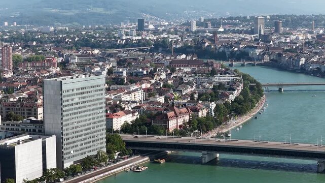 Aerial view of basel cityscape with rhine river and bridge traffic
