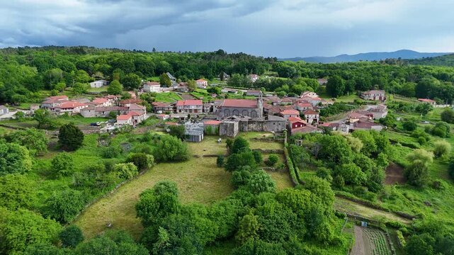 Aerial orbiting view of the medieval Santa Marina de Augas Santas village