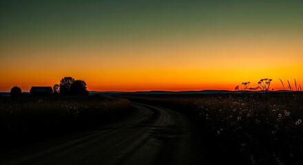 Fototapeta premium Rural Sunset Dirt Road Leading to Farm Buildings, Golden Hour Landscape