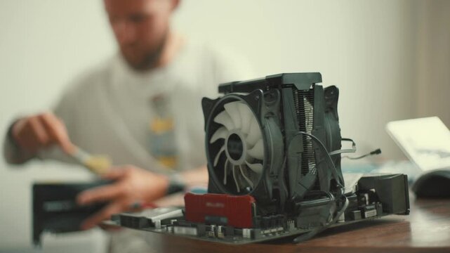 Building a computer with a focus on cooling system assembly and component testing in a home workspace