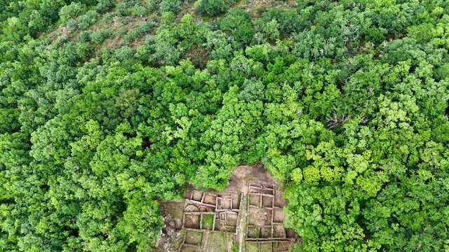 Aerial revealing shot of Santa Marina de Augas Santas archaeological site