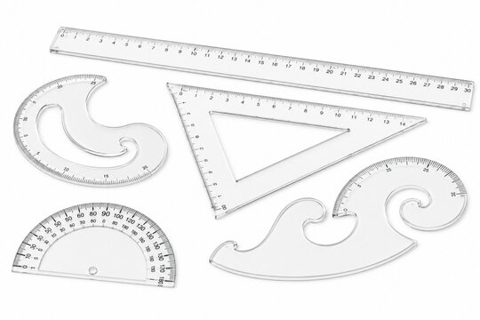 A set of clear plastic drafting and drawing tools including rulers, protractor, and set squares for geometric measurements and technical illustrations
