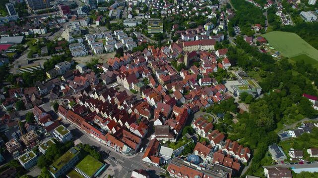 Aerial panoramic view above the old town around the city Leonberg on a sunny spring day. 