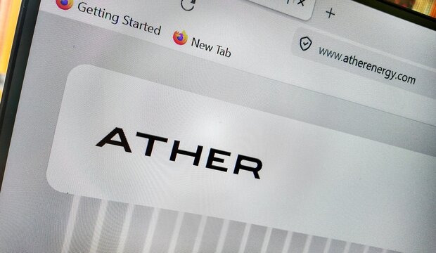 The image shows a computer screen displaying a webpage with the word "ATHER" in bold letters. The browser tabs visible include "Getting Started" and "New Tab," while the URL bar shows www.atherenergy.
