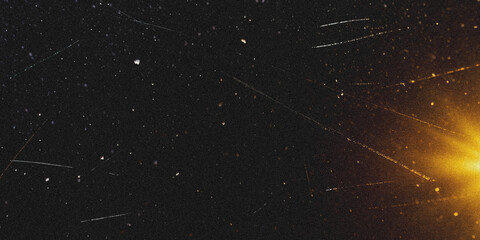 Bright comet streaking across starry night sky with long tail © Nasrin