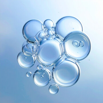 Macro shot of clustered blue water bubbles with reflections