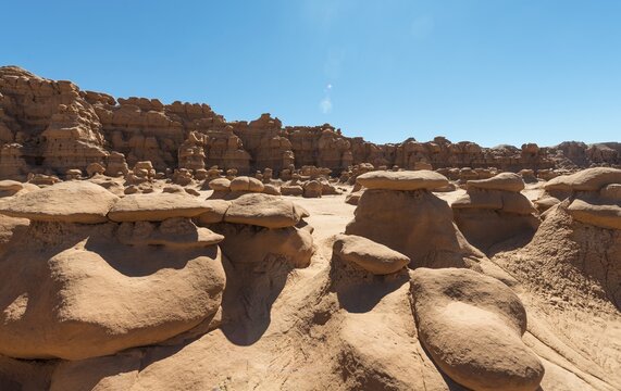 Eroded hoodoos, Entrada Sandstone rock formation, Goblin Valley State Park, San Rafael Reef Desert, Utah, Southwest, USA