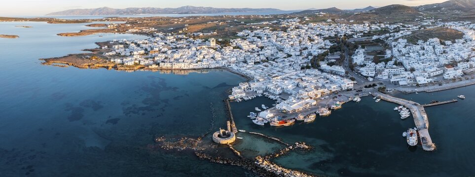 Evening atmosphere, aerial view, town view and harbour of Naoussa, harbour wall with Venetian ruins, Paros, Cyclades, Greece