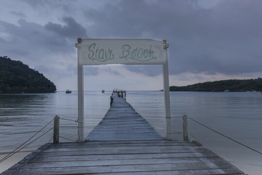 Jetty on Siam Beach in front of sunrise, Ko Kut or Koh Kood, Gulf of Thailand, Thailand