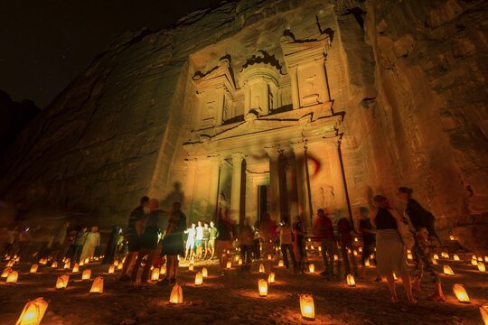 Candles in front of the Pharaoh's treasure house at night, illuminated facade of the treasure house Al-Khazneh, Khazne Faraun, mausoleum in the Nabataean city Petra, near Wadi Musa, Jordan