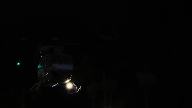 Helicopter flying slowly in the sky