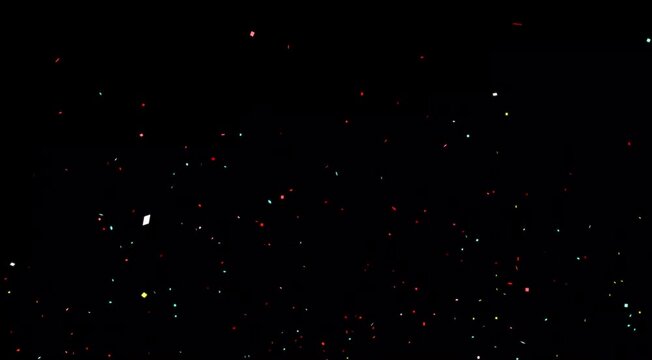 Abstract colorful confetti explosion with dynamic particle motion on black screen, festive 4k seamless loop for modern celebration, corporate event, and joy-filled visual effects.