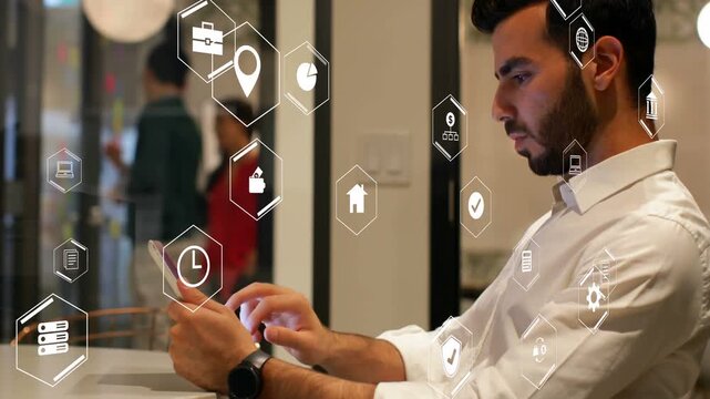 Man tapping tablet in tech lounge, hex icons appearing around hands and shifting for app alerts