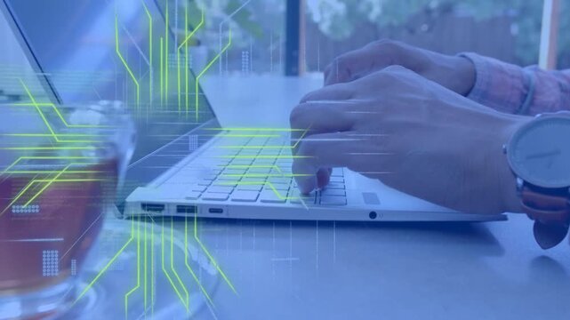 Man typing laptop causing neon circuits, green code scrolling, briefly obscuring hands while coding