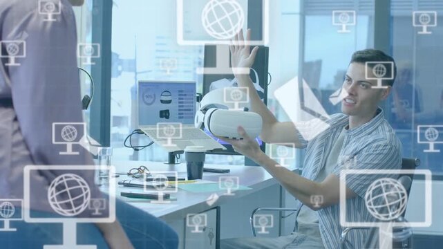 Man showing VR headset, rotating and activating monitor or globe or envelope icons, showing tech net