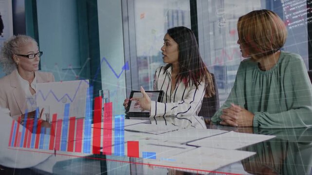 Center presenter tapping tablet, presenting business data, red and blue charts growing over table
