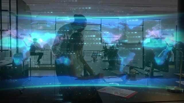 Lead leaning pointing and urging seated woman typing for review while holo business map on monitors
