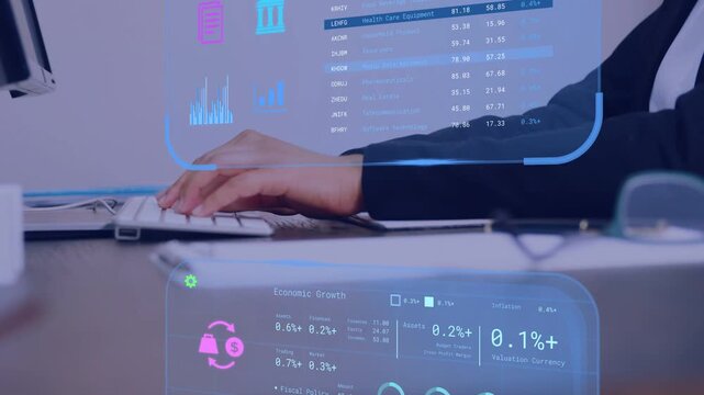 Woman typing on keyboard, causing augmented finance charts and dashboards updating for stock review