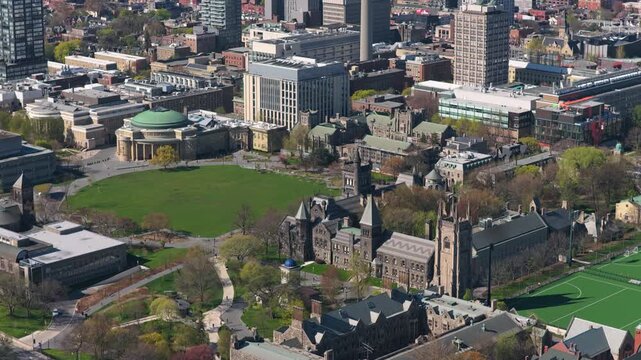 University of Toronto campus aerial showing historic architecture of University College, Convocation Hall, King's College Circle surrounded by downtown buildings