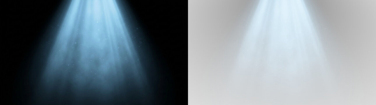Two beams of blue stage light with fog effect on black background