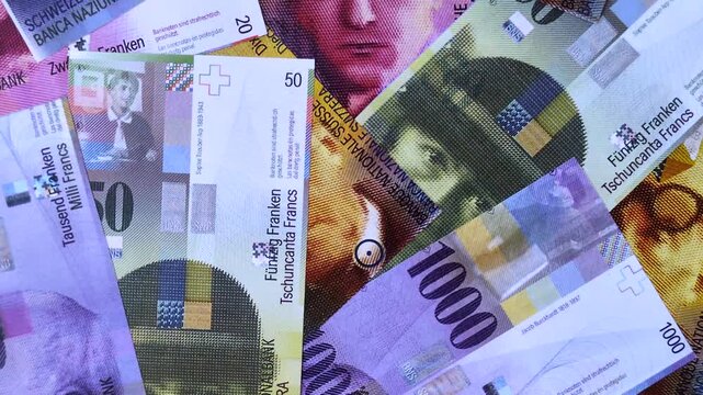 Switzerland, Swiss franc paper money and coins, financing and commodity exchange, trade. Swiss currency as a background for your design