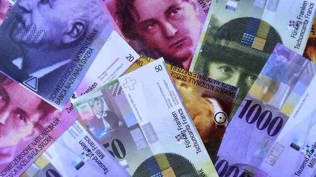Switzerland, Swiss franc paper money and coins, financing and commodity exchange, trade. Swiss currency as a background for your design