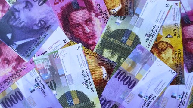 Switzerland, Swiss franc paper money and coins, financing and commodity exchange, trade. Swiss currency as a background for your design