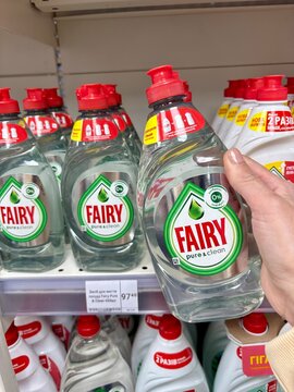 03.05.2026 Ukraine, Kharkov Woman's Hand Holding a Bottle of Fairy Sensitive Dishwashing Liquid in a Supermarket.
