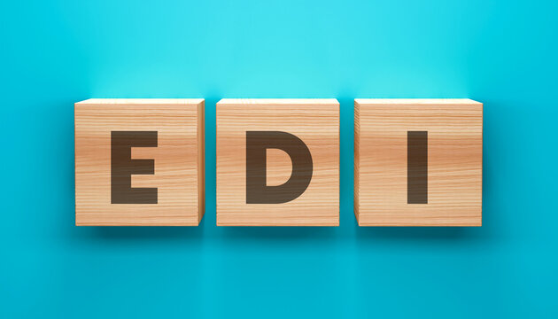 EDI Cubes: Three wooden cubes with the letters E, D, and I displayed, set against a vibrant turquoise background. A simple and visually striking design.
