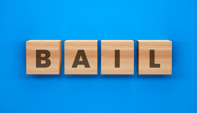 Bail concept: Wooden blocks spell out the word BAIL on a vibrant blue background, suggesting the concept of financial security or support. 