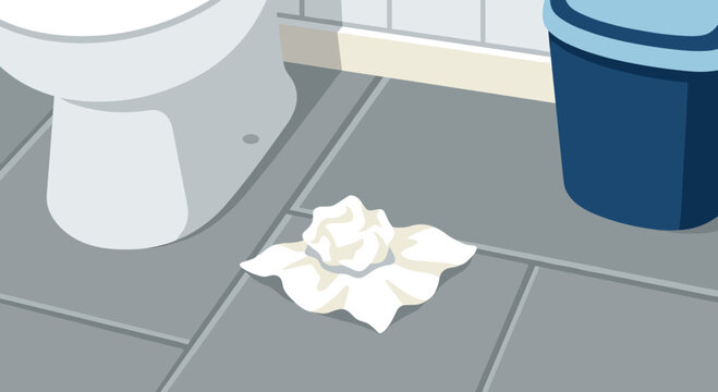 Single crumpled tissue on tiled bathroom floor Concept of hygiene and cleaning