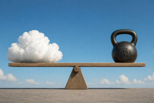 A cloud and a weight on a wooden scale. Space for text.