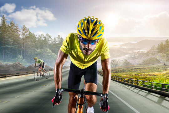 Cycling. A captivating shot of a helmeted biker riding along an asphalt road. Cycling competitions. Active recreation. Sport. Professional road bicycle racer close up view