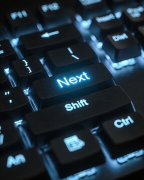 A glowing &ldquo;Next&rdquo; key symbolizes moving forward in a digital world.