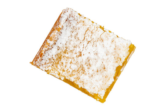 Isolated lemon bar cookie sprinkled with powdered sugar