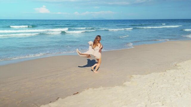Young woman walking barefoot on a vast sandy beach at the ocean's edge, wearing a flowing kaftan, experiencing freedom and tranquility during a perfect summer day vacation