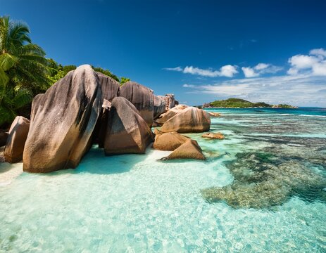 crystal clear waters and stunning granite boulders at anse source d argent in seychelles