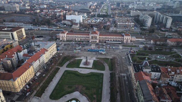 Aerial view of Zagreb Cathedral and the historic Kaptol district. Cinematic drone shot of the Gothic spires and the medieval walls of the Cathedral of the Assumption of the Blessed Virgin Mary in Croa