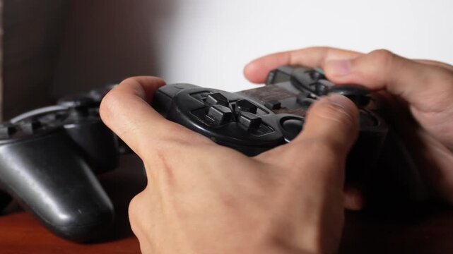 video game controller in hand