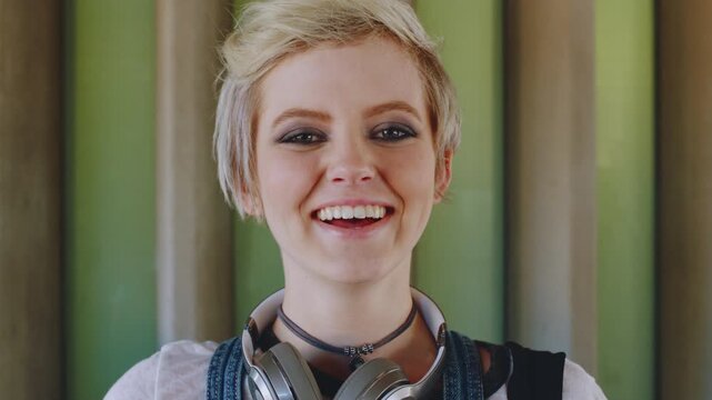 Student, face and girl with laugh at college for learning, study opportunity and arts education. Funny scholar, gen z person and happy on campus for university semester, music course and scholarship