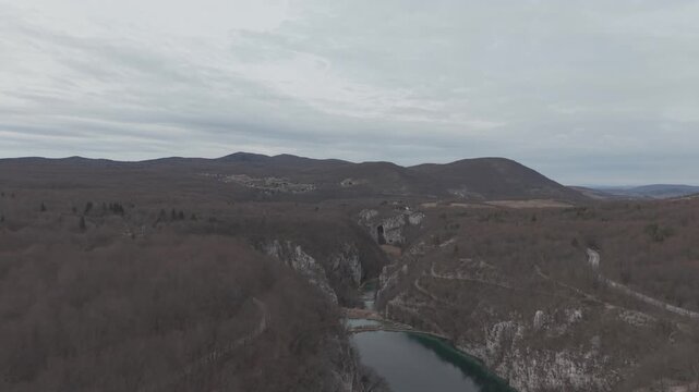 Aerial view of the stunning waterfalls and turquoise lakes in Plitvice Lakes National Park. Cinematic drone shot of the UNESCO World Heritage site in Croatia